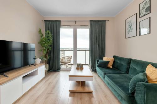 Modern Apartment with Parking and Balcony by Noclegi Renters