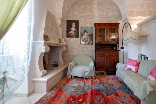 a living room with a couch and a table at Villa Tonia in Fasano