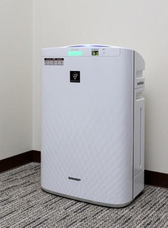 a white refrigerator sitting in the corner of a room at JR-East Hotel Mets Fukushima in Fukushima