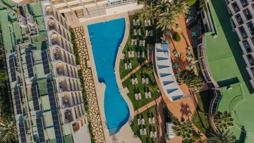 an overhead view of a river between buildings at Medplaya Hotel Pez Espada in Torremolinos