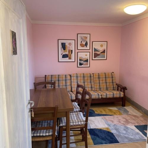 a living room with a couch and a table at Casa Bicocchi in Lanciole