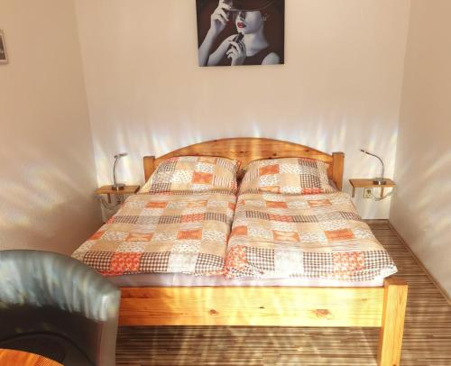 a bed with two pillows on it in a bedroom at Ferienwohnungen Seestraße in Sassnitz