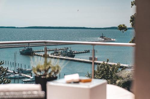 a view of a marina with boats in the water at Villa Friede Marie FeWo Ostseeweitblick in Sassnitz