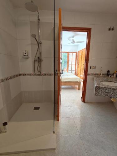a bathroom with a shower and a sink at Casa Mimosa, Calonge Cabanyes in Calonge