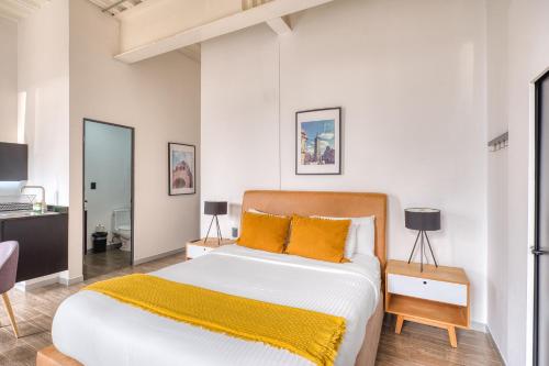 Llit o llits en una habitació de U-CO Live Centro