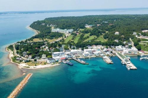 an aerial view of a harbor with boats in the water at Above Mustang Condos in Mackinac Island