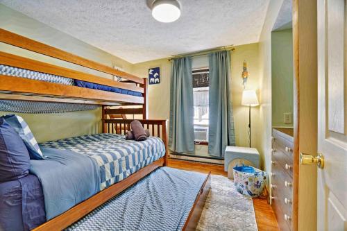 a bedroom with a bunk bed and a window at Lake Front Firepit Dock Game Room Pets OK in Locust Lakes Village