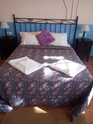 Katil atau katil-katil dalam bilik di Hotel Rural Terrablanca