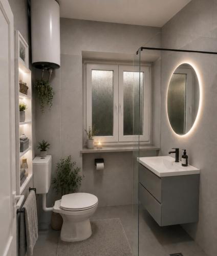 a bathroom with a toilet and a sink and a mirror at Apartment "MANNA in Korčula