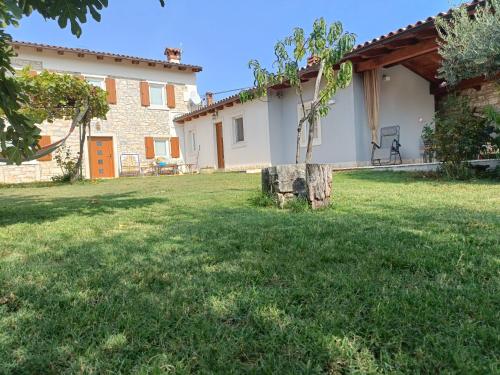 Casa per 6 persone con giardino e portico
