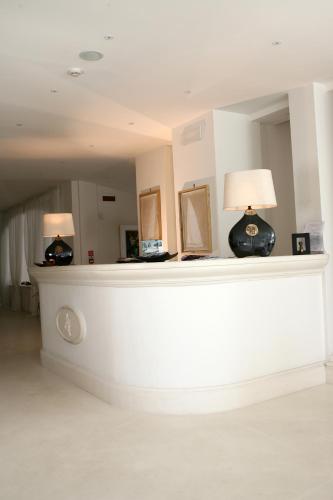 two lamps sitting on a counter in a room at Il San Francesco Charming Hotel in Sabaudia
