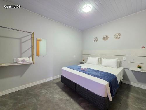 Casa 2 Quartos com varanda 10 min do centro