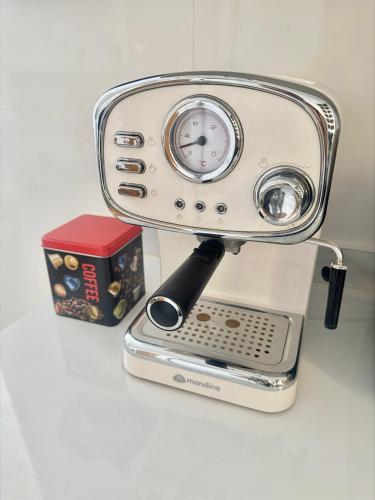 a toaster sitting on a counter next to a box at VUT Torreón de los Guzmanes in Ávila
