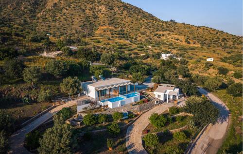 an aerial view of a house on a hill at Thyme 1 in Agia Galini