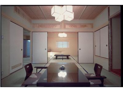 a large room with a table and two chairs at Yoshimatsu in Hakone