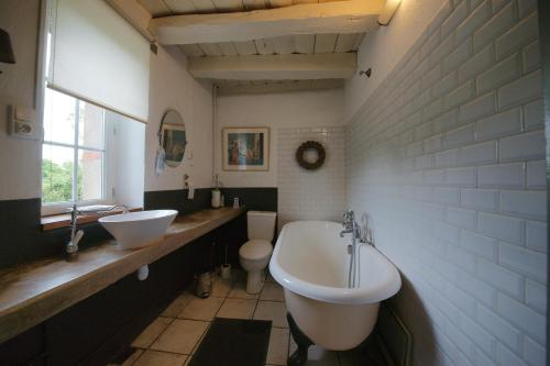 Vonios kambarys apgyvendinimo įstaigoje Sans Soucis