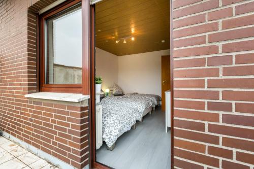 Ένα ή περισσότερα κρεβάτια σε δωμάτιο στο Apart2Stay Dormagen