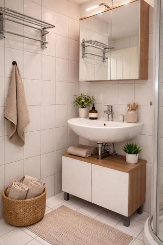 a bathroom with a sink and a mirror at Ferienhaus 147 in Sekull