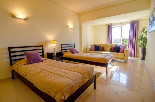 A bed or beds in a room at Villa Vista