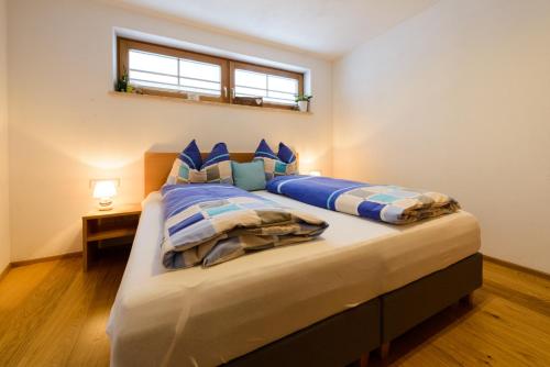 Postel nebo postele na pokoji v ubytování Appartement Kufsteinblick