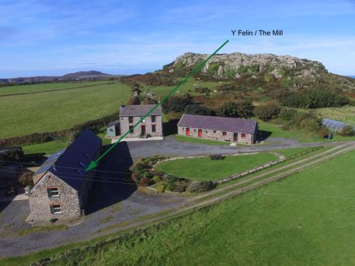 an aerial view of a house in a field at Y Felin - The Mill in St. Davids