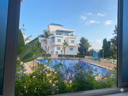 a view of a building from a window at Luxury apartment Smir Park - Marina Smir in Marina Smir