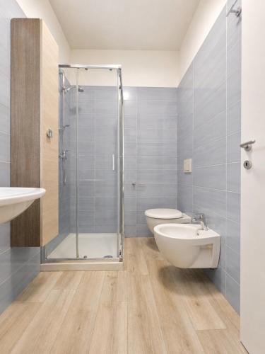 a bathroom with a shower and a toilet and a sink at A due passi dal mare in Giulianova