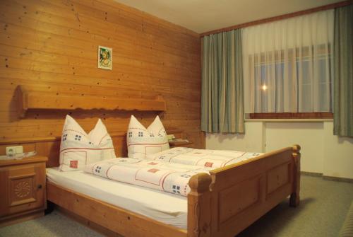 Postel nebo postele na pokoji v ubytování Ferienwohnung Frauenhoffer