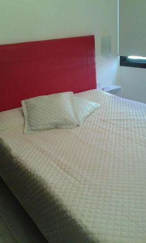 מיטה או מיטות בחדר ב-Aires de la Villa II