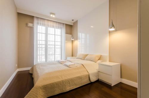 Posteľ alebo postele v izbe v ubytovaní Old Town Luxury Apartment