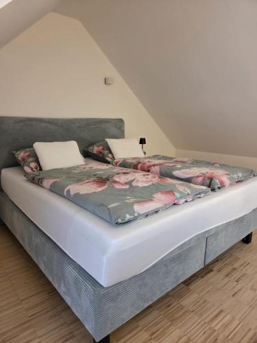 a large bed in a room with a mattress at Apartmán Kräm in Klatovy