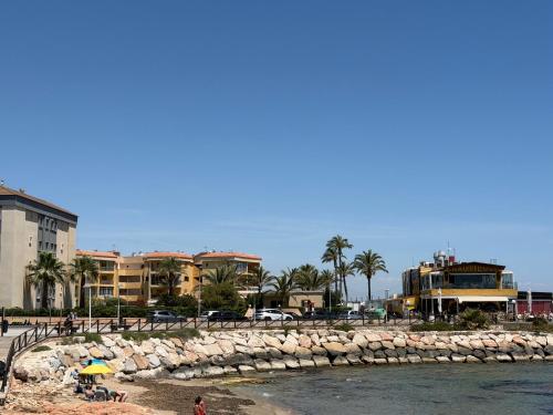 Stylish Frontline Punta Prima Suite with Sea Views