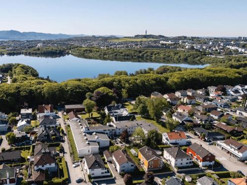 an aerial view of a small town next to a lake at Stavanger Urban Folkehøyskole in Stavanger