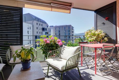 T3 2 chambres avec balcon et place de stationnement