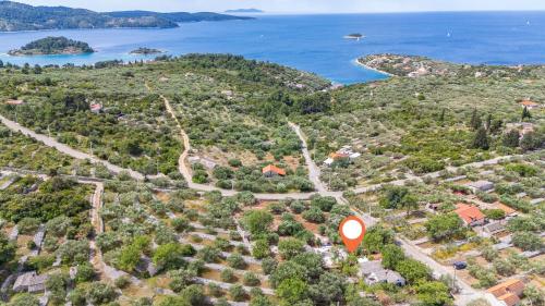 an aerial view of a house with a red sign at House Darin dvor in Vela Luka