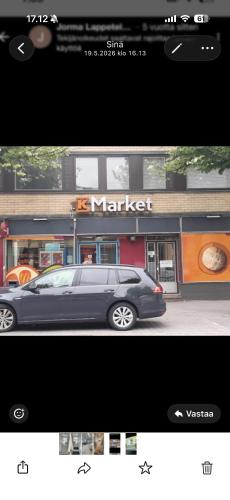 a picture of a car parked in front of a building at Office to sleep in heard of Lohja in Lohja