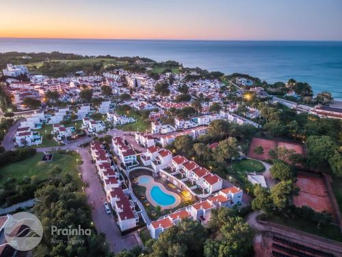 an aerial view of a resort near the ocean at Aldeamento Turistico da Prainha in Alvor