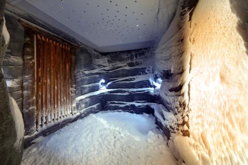an ice corridor with snow on the walls and ceilings at Hard Rock Hotel Tenerife in Adeje