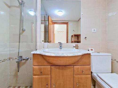 a bathroom with a sink and a shower at Albatros Playa 3 - 3409 in Mar de Cristal