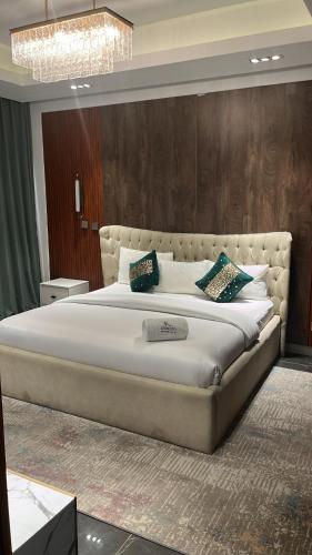 a bedroom with a large bed in a room at Macdonald Residence in Lagos