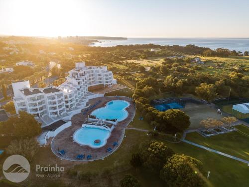 an aerial view of a resort with a swimming pool at Prainha Clube in Alvor