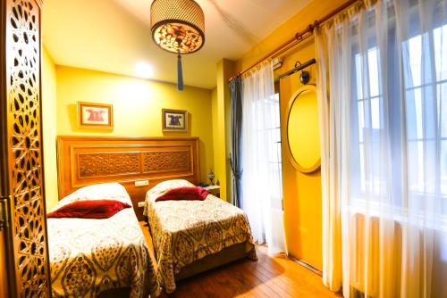 Postel nebo postele na pokoji v ubytování Merial Hotel Sultanahmet