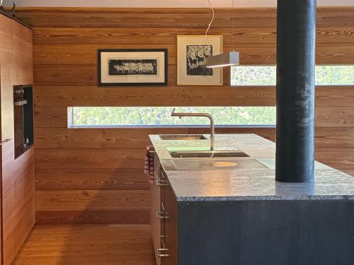 a kitchen with a sink and a counter top at Chalet Oberjuval in Kastelbell-Tschars