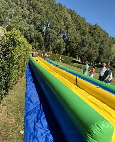 a group of people playing on a slide in a park at Camping 3 étoiles - Piscine - ccbfghc in Mamers