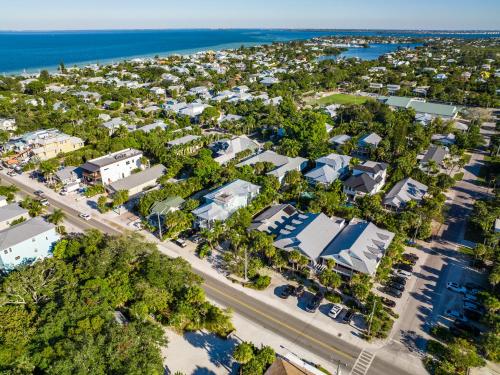 an aerial view of a resort with the ocean at Buttonwood Cottage in Anna Maria