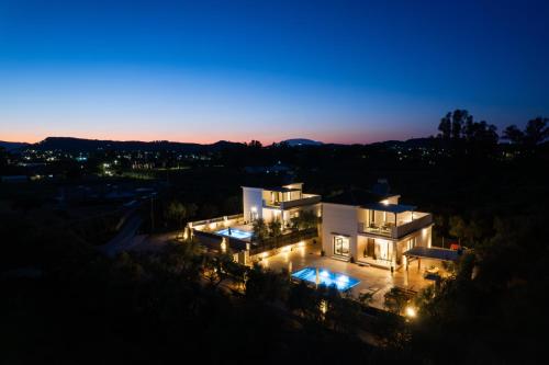an aerial view of a house at night at Villa Pagliaricci in Gaïtánion