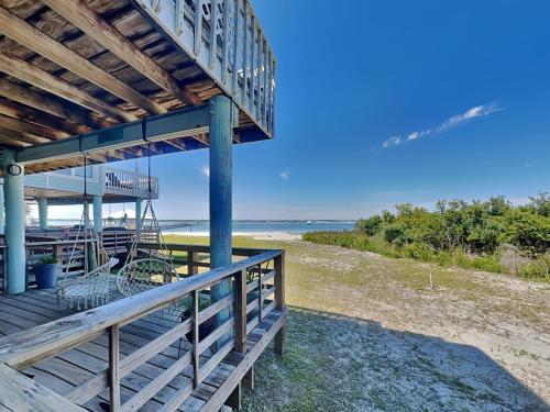 a deck with a view of the beach at Sandcastle Townhomes #24 in Navarre