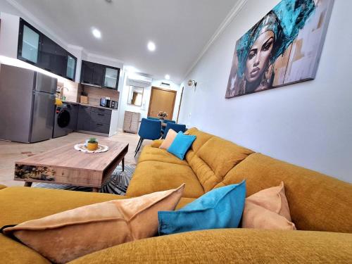 a living room with a couch and a table at Marina Forest in Sozopol