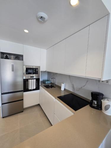 Modern ground floor La Mata apartment with direct access to the pool