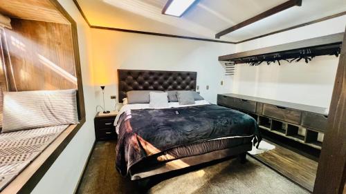 a bedroom with a large bed in a room at House 78 in Coquimbo